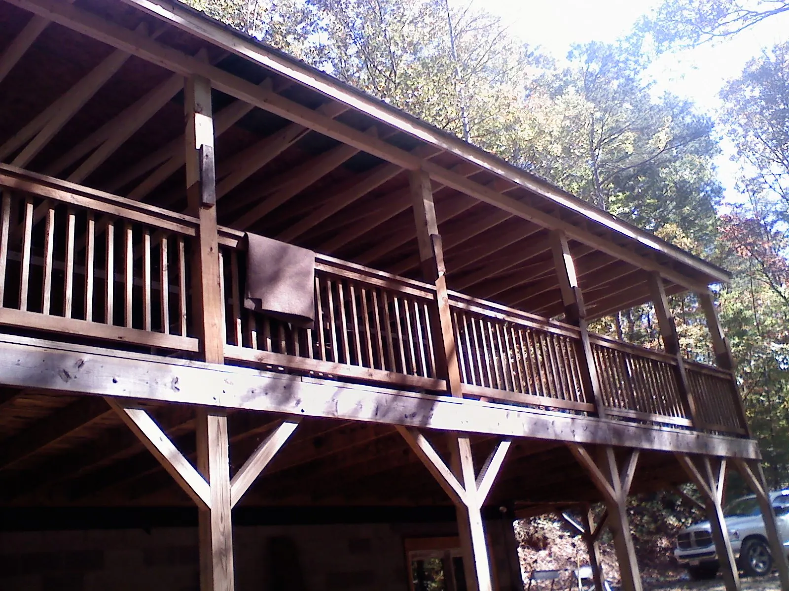 Timber framing under a new elevated porch and deck — Roof Leak Repair in Waverly by Roofing Brothers